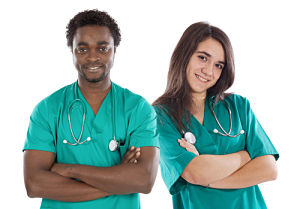 Two young Nurses (male and female) smiling.