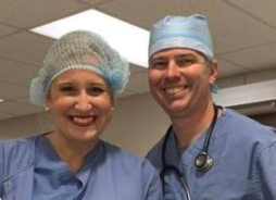 Two Anesthetist (female and male) smiling.